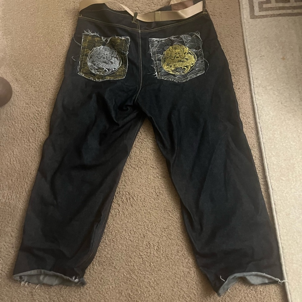 Used red monkey jeans